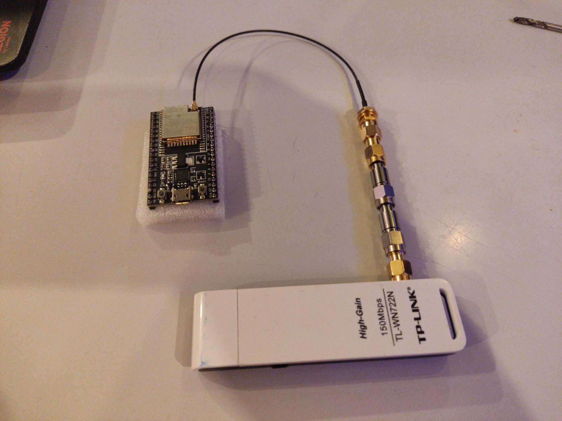 Wi-Fi dongle connected to the ESP32, with two 30&nbsp;dB attenuators in between